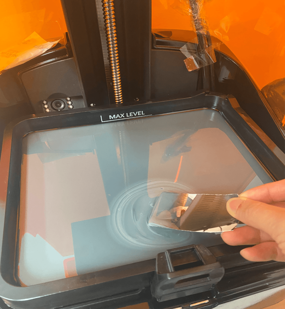 Resin being mixed inside a DLP/SLA printer