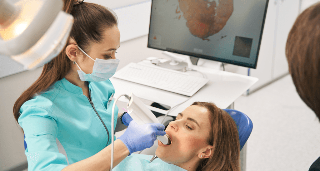 Scanning a patient's teeth with an intra-oral scanner